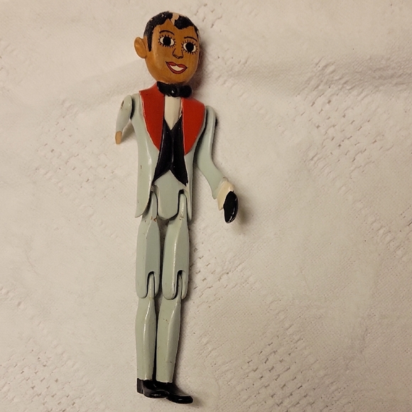 Charming Wooden Puppet with Red and Black Details